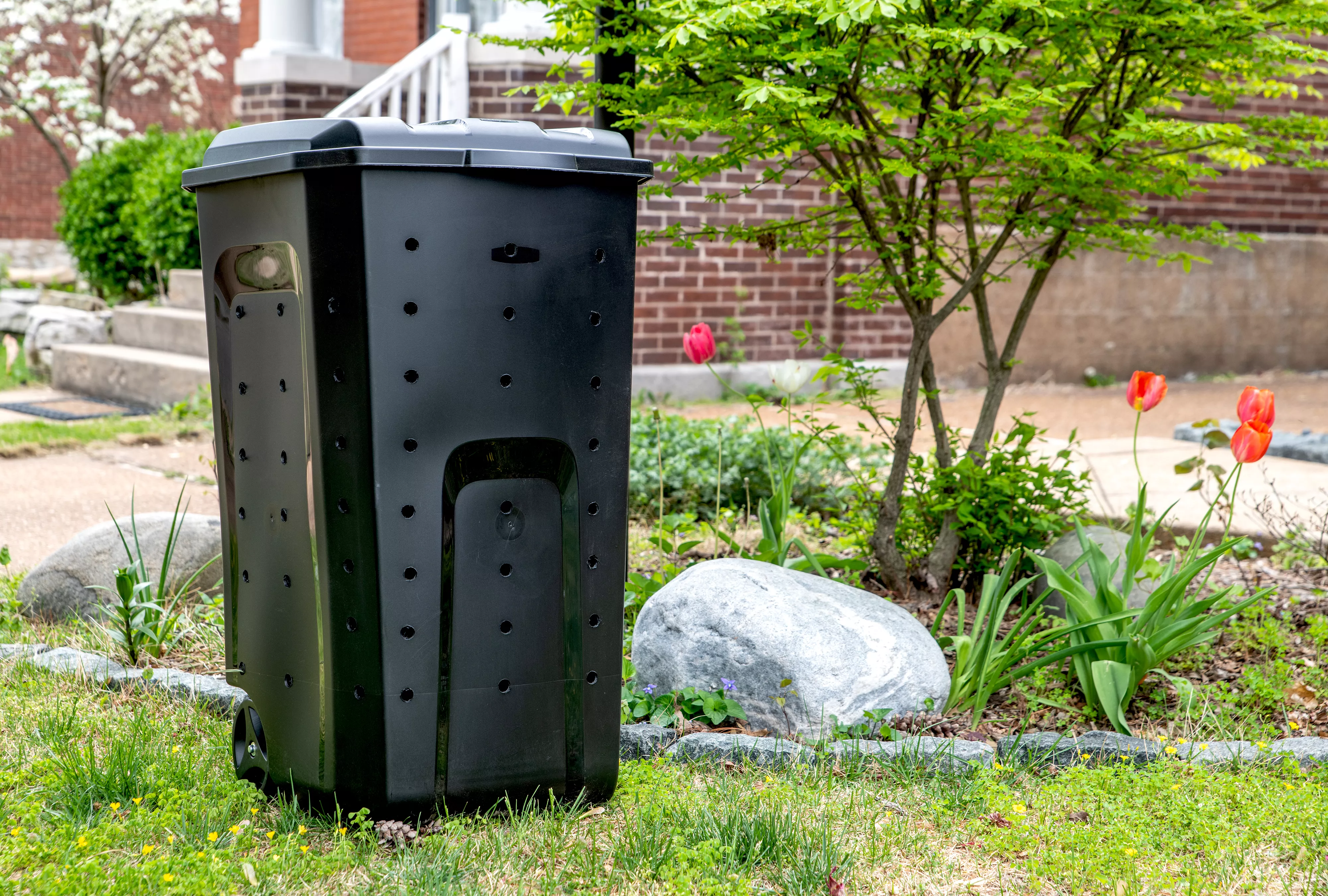 Pulled out shot of DIY compost bin